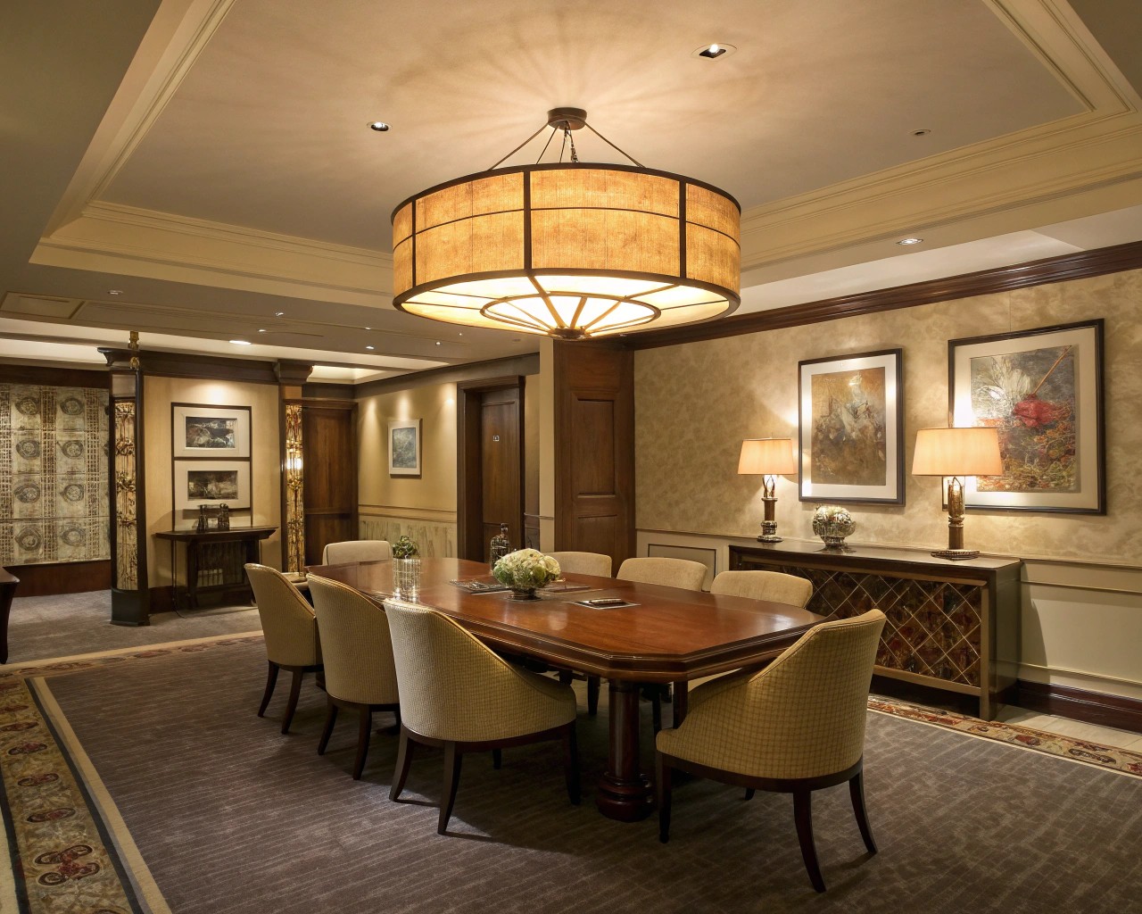 Statement lighting transforms the room, acting as a visual anchor.